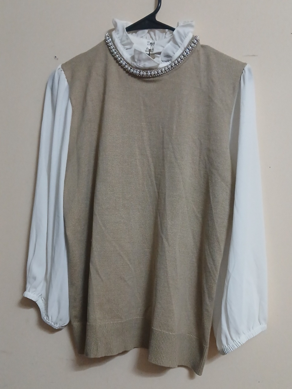 Cable & Gauge Beige Knit Vest with White Blouse and Jeweled Collar